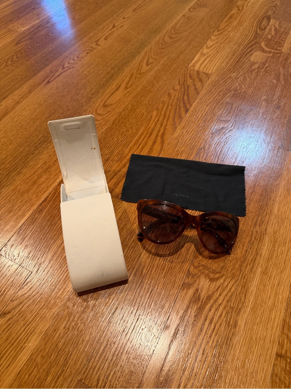 Authentic Prada Brown Tortoiseshell Sunglasses with Black Cloth and White Case